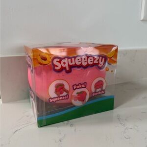 Squeezy Peach Squishy Toy